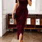 Red off-shoulder velvet dress styled for chic evening occasions.






