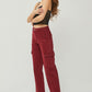 Fashion-forward cargo jeans with a wide leg silhouette and practical design.
