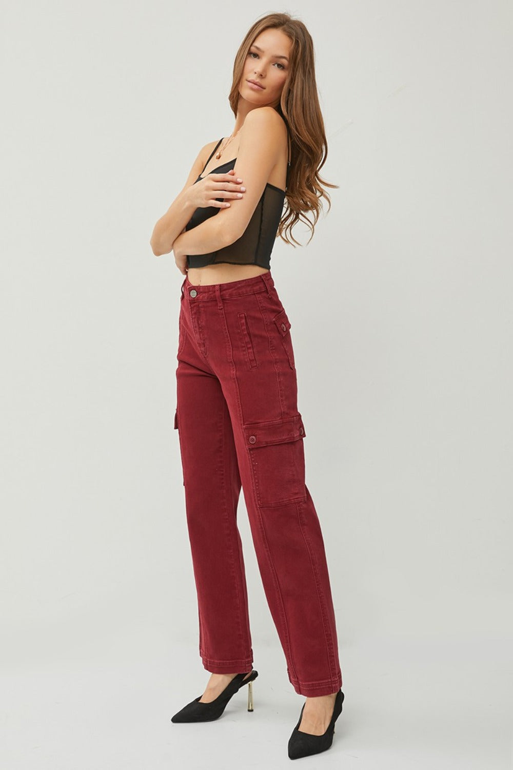 Fashion-forward cargo jeans with a wide leg silhouette and practical design.
