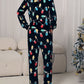 Festive lounge jumpsuit featuring holiday lights on soft fleece fabric
