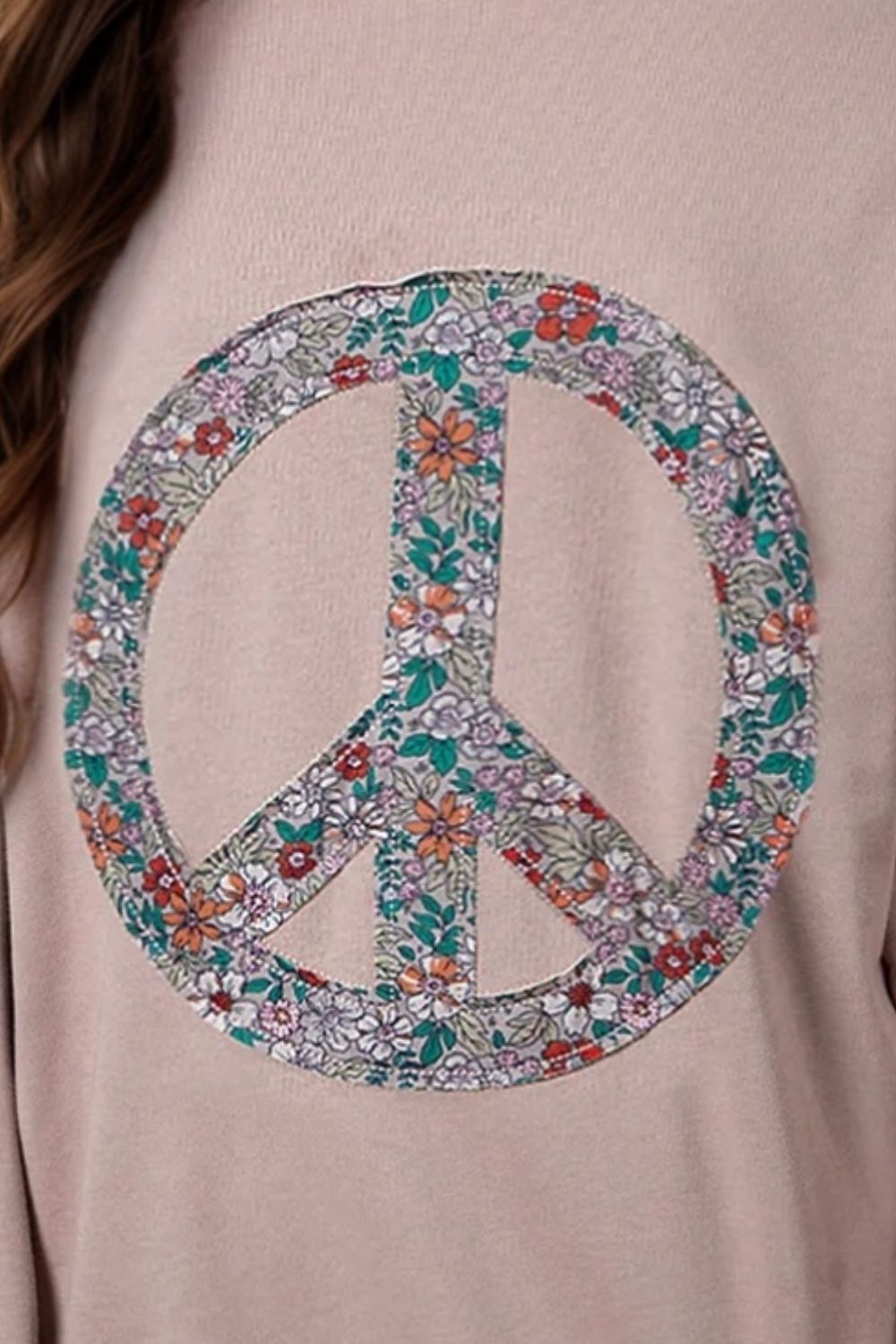 Floral retro-inspired peace sign sweatshirt for women
