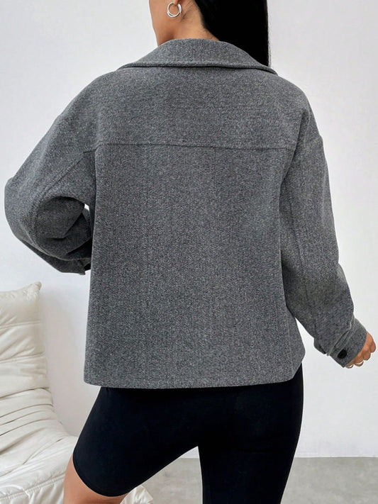 Stylish gray shacket for women, perfect for layering over casual outfits.
