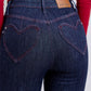 Close-up of heart-shaped back pockets on Judy Blue skinny jeans.
