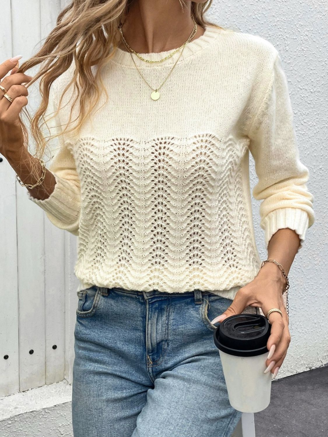 Trendy butter yellow sweater with cutouts, perfect for cool days