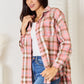 Classic women’s long-sleeve plaid shirt featuring a front pocket.
