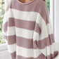 Relaxed-fit pink and white striped sweater for everyday comfort.
