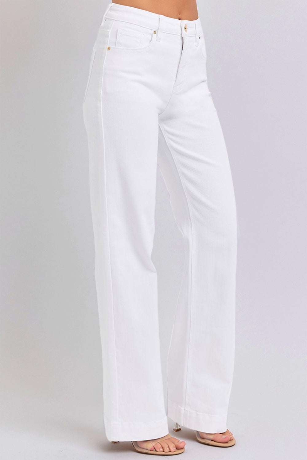 White high-waist jeans with a straight leg cut by RISEN, perfect for versatile styling.