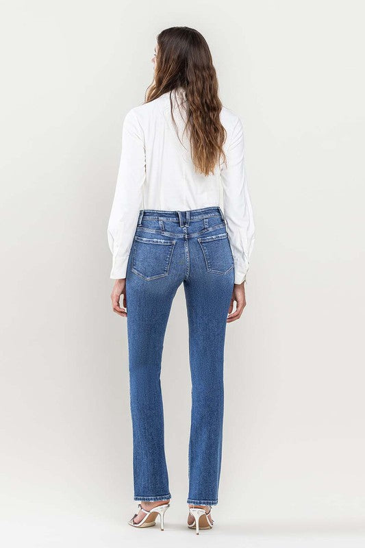 Women's slim bootcut jeans in a classic medium blue wash.