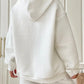 casual white hoodie with a soft waffle knit texture
