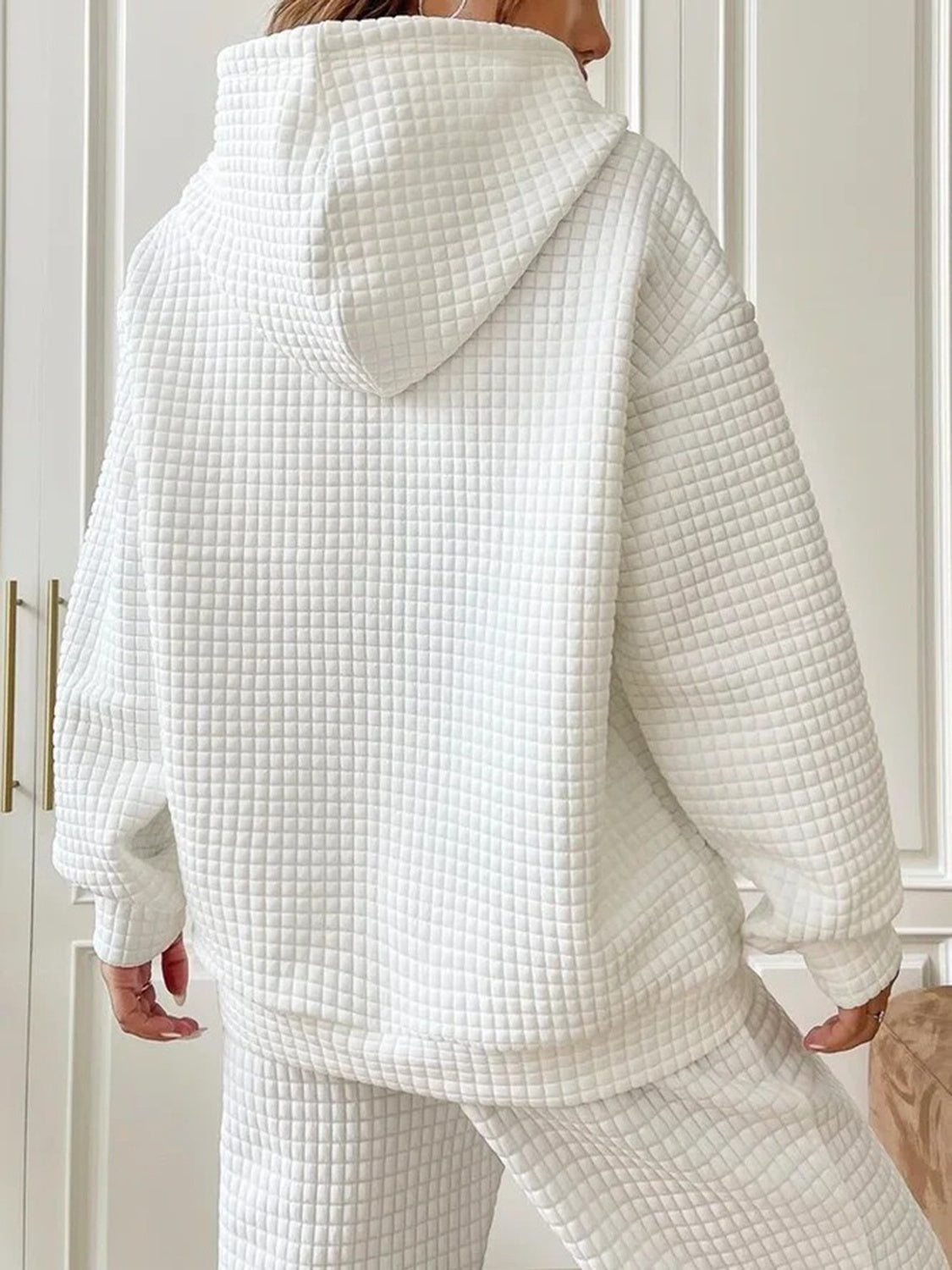 casual white hoodie with a soft waffle knit texture
