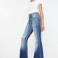 Women's high-rise flare jeans in medium wash with a wide waistband and distressed finish.
