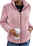 Front view of a pink women's fleece sherpa jacket with a zip-up front and cozy fit.
