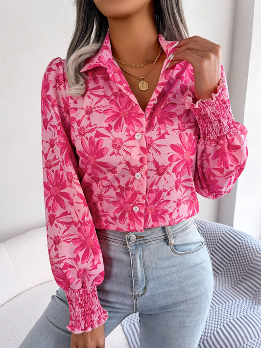 Close-up of floral button down shirt in pink with long sleeves
