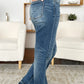 Women's Judy Blue jeans in medium wash with a unique release hem detail.
