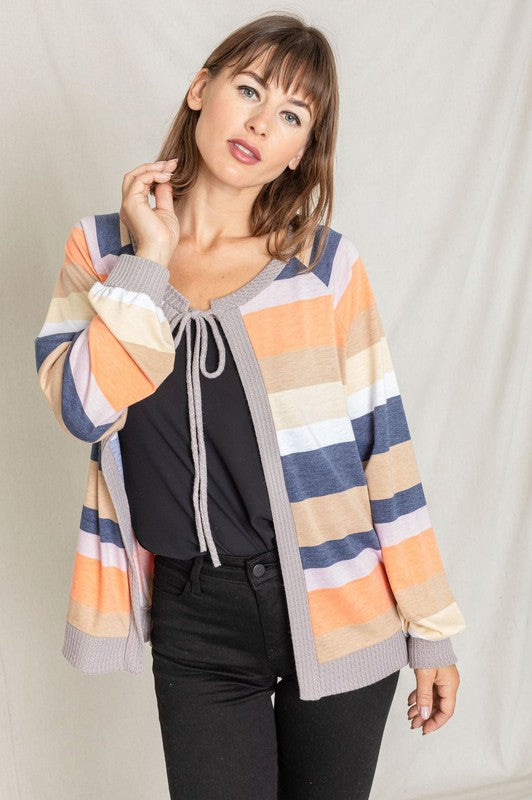 Stylish striped cardigan in orange, showcasing its tie-front detail.